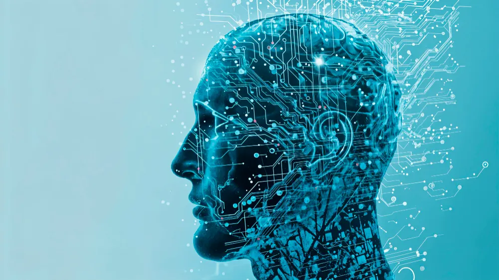 Perfil de uma cabeça humana em tons de azul-claro com circuitos e pontos de luz que se espalham sobre o cérebro.